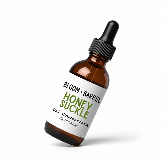Bottle of Bloom + Barrel Honey Suckle Oil Concentrate on a white background