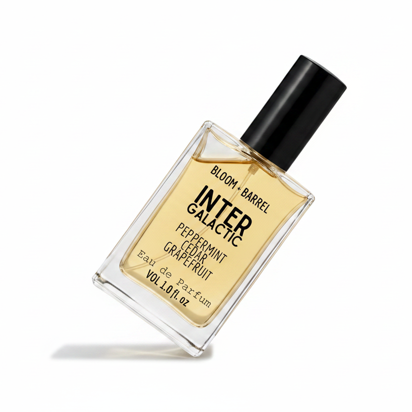 Perfume bottle labeled 'Bloom & Barrel InterGalactic' on a white background