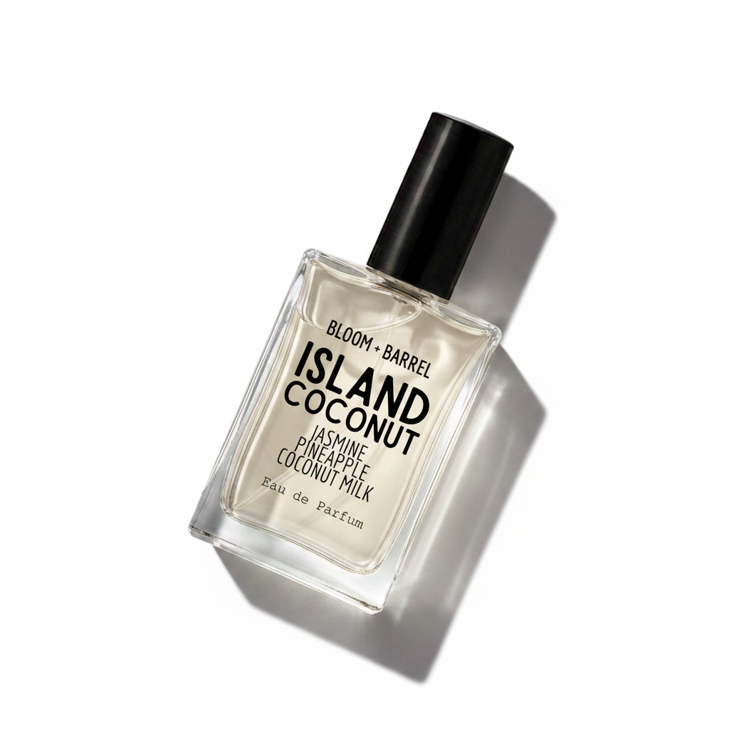 Bloom Barrel Island Coconut Eau de Parfum in a clear rectangular glass bottle with a black cap, on a plain white background.
