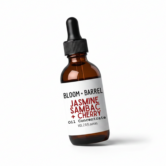 Bottle of Bloom + Barrel Jasmine Sambac + Cherry oil concentrate on a white background