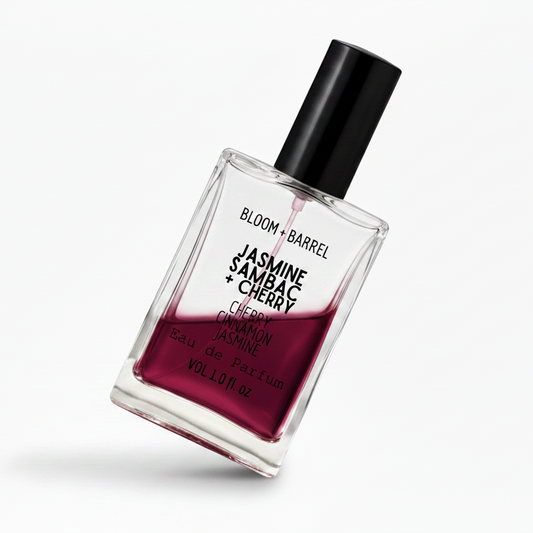 Perfume bottle labeled 'Bloom + Barrel Jasmine Sambac + Cherry' on a white background