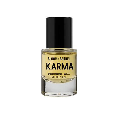Bottle of Bloom & Barrel Karma Perfume Oil on a white background