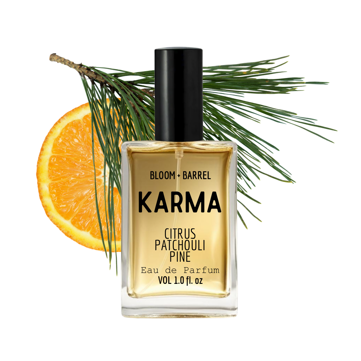 Perfume bottle labeled 'Karma' with an orange and pine branch on a white background