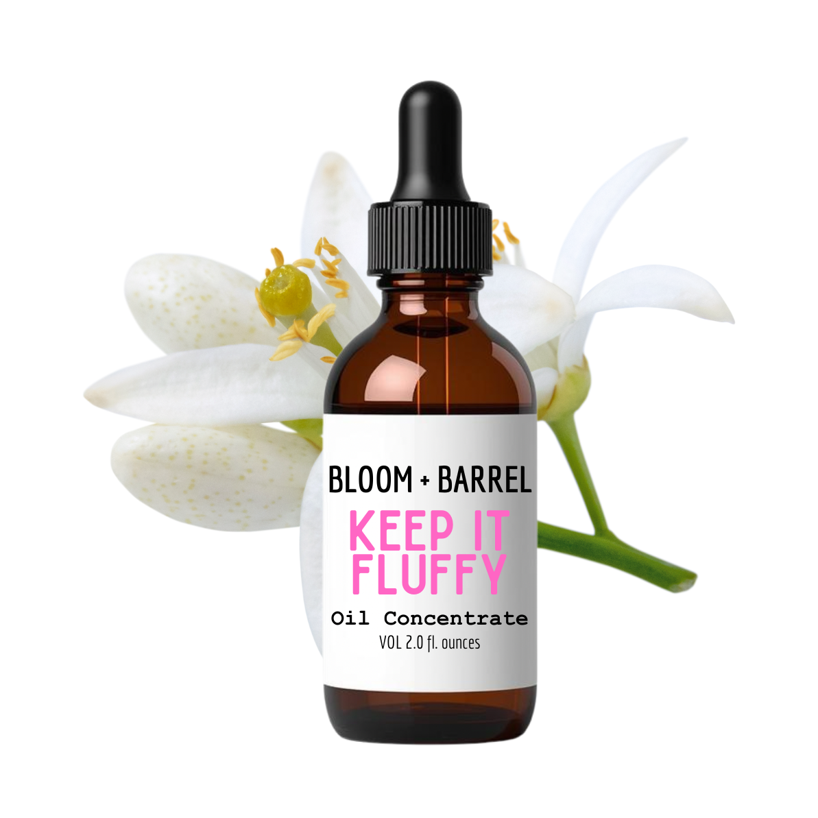 Bottle of 'Keep It Fluffy' oil concentrate by Bloom + Barrel with flowers in the background.