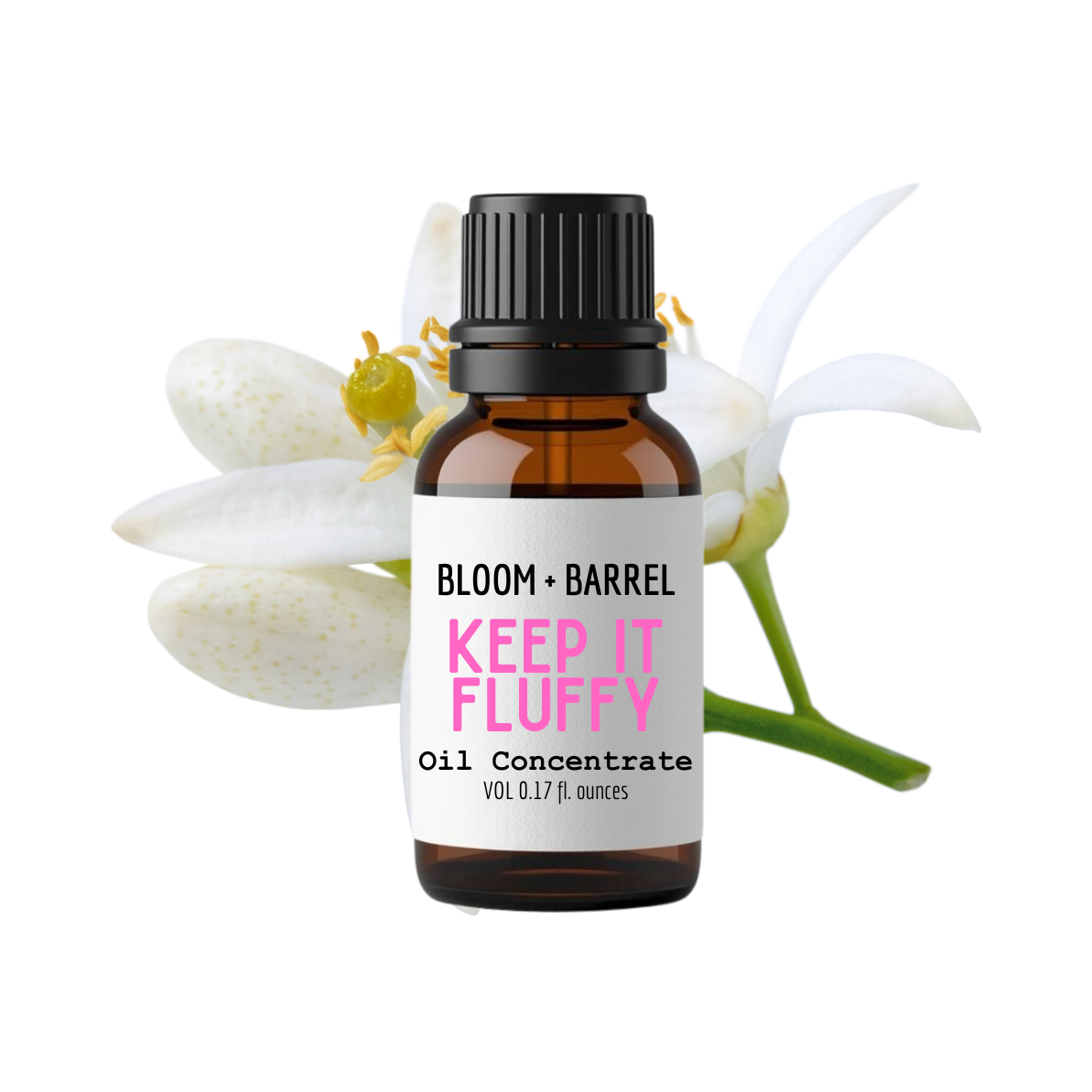 Bottle of 'Keep It Fluffy' oil concentrate by Bloom & Barrel with flowers in the background.