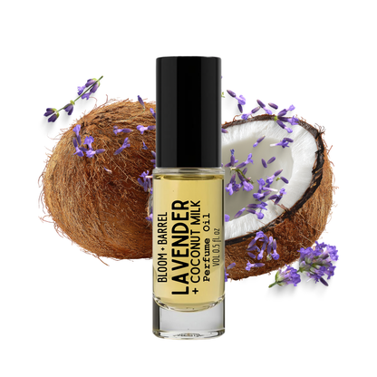 Perfume bottle labeled 'Lavender + Coconut Milk' with a coconut and lavender flowers on a white background