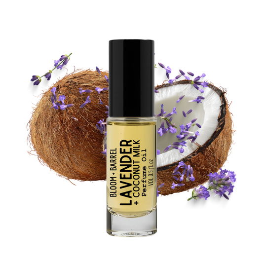 Perfume bottle labeled 'Lavender + Coconut Milk' with a coconut and lavender flowers on a white background