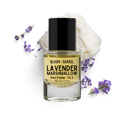 Bottle of Bloom & Barrel Lavender Marshmallow perfume oil with lavender flowers on a white background