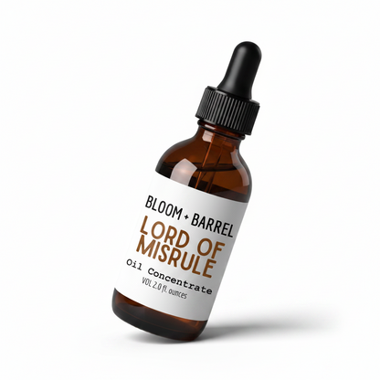 Bottle of Bloom + Barrel Lord of Misrule Oil Concentrate on a white background