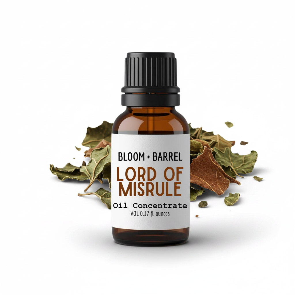 Bottle of 'Lord of Misrule' oil concentrate by Bloom & Barrel with dried leaves on a white background