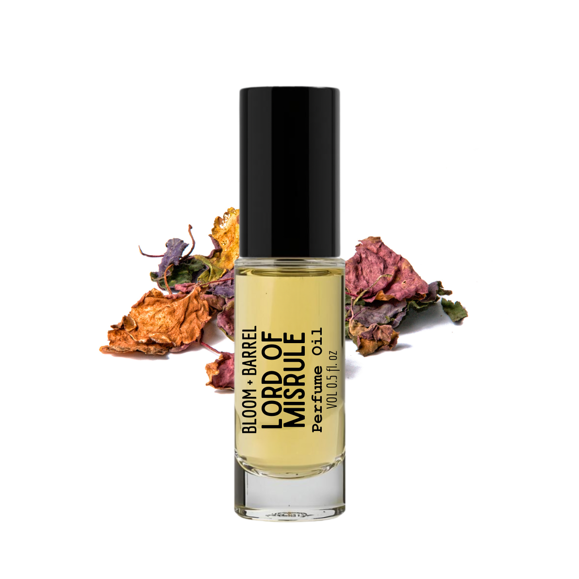 Perfume bottle labeled 'Lord of Misrule' with dried flowers on a white background