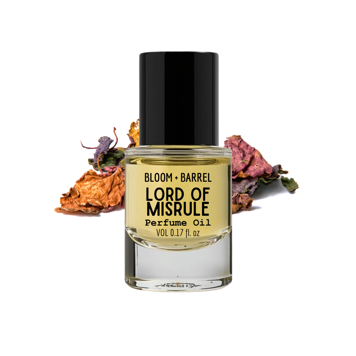 Perfume oil bottle labeled 'Lord of Misrule' by Bloom & Barrel with dried flowers on a white background