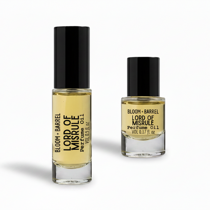 Two bottles of Bloom & Barrel Lord of Misrule perfume oil on a white background