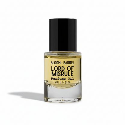 Perfume oil bottle labeled 'Lord of Misrule' by Bloom & Barrel on a white background