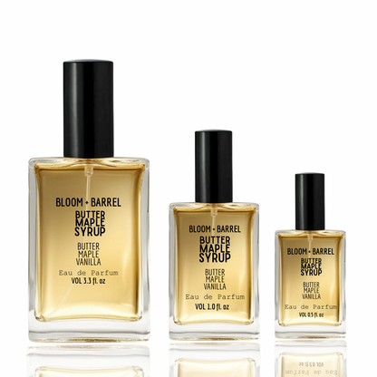 Three bottles of Bloom + Barrel Butter Maple Syrup Eau de Parfum on a white background