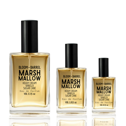 Three bottles of Bloom + Barrel Marshmallow perfume on a white background