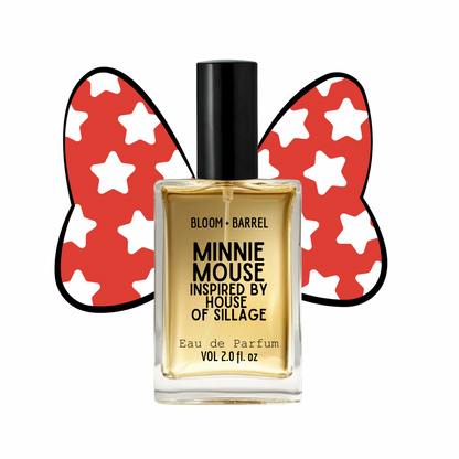A rectangular glass perfume bottle labeled 'MINNIE MOUSE INSPIRED BY HOUSE OF SILLAGE' with a black cap, filled with golden liquid, set against a white background with a red-and-white star-patterned butterfly graphic behind it. Visible brand text on the bottle includes 'BLOOM + BARREL'.