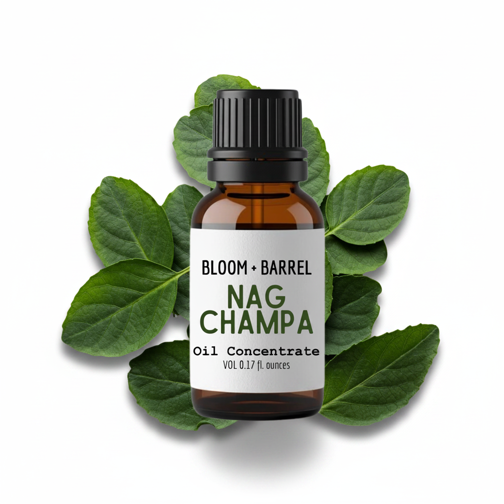 Bottle of Bloom & Barrel Nag Champa oil concentrate surrounded by green leaves on a white background