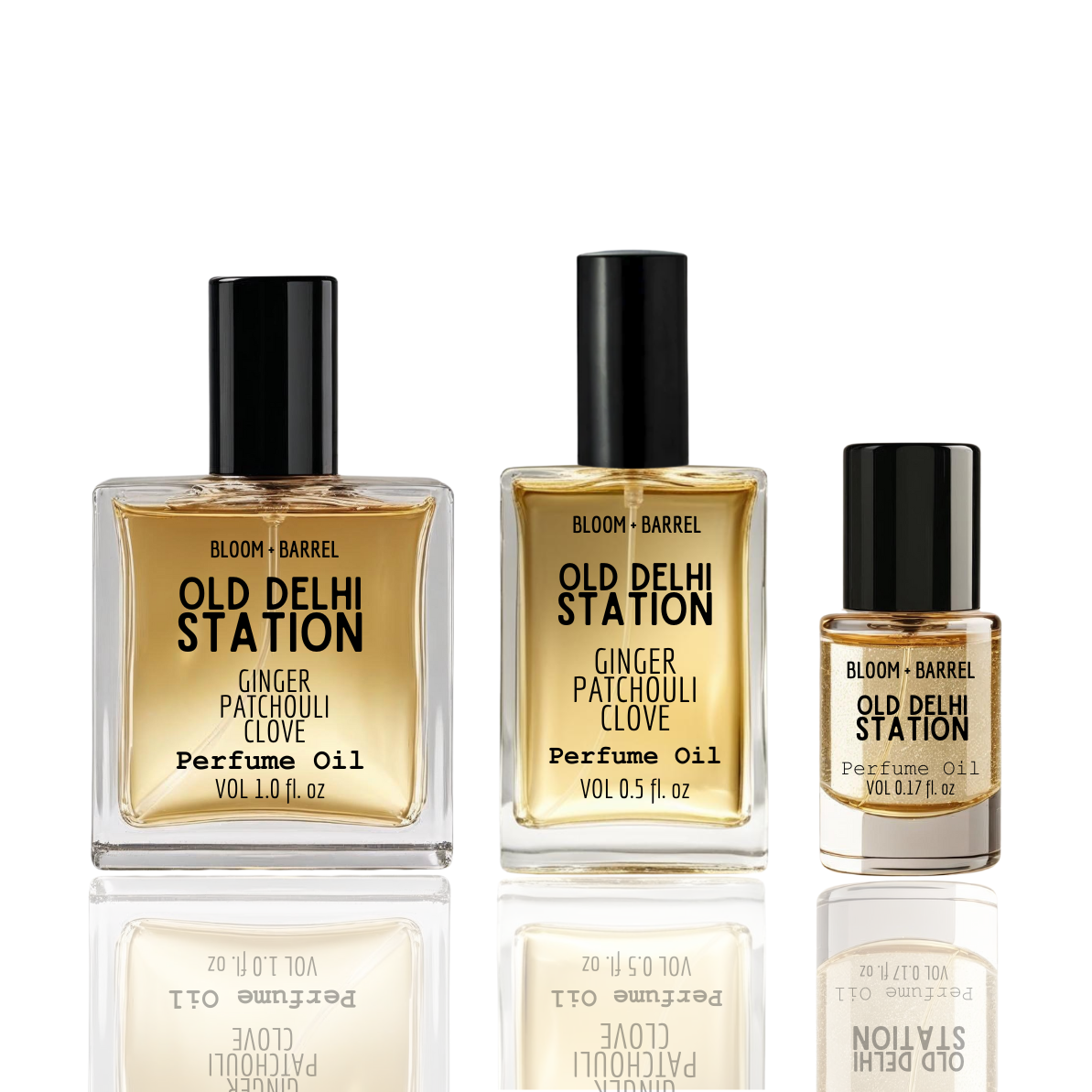 Three bottles of Bloom & Barrel Old Delhi Station perfume oil on a white background