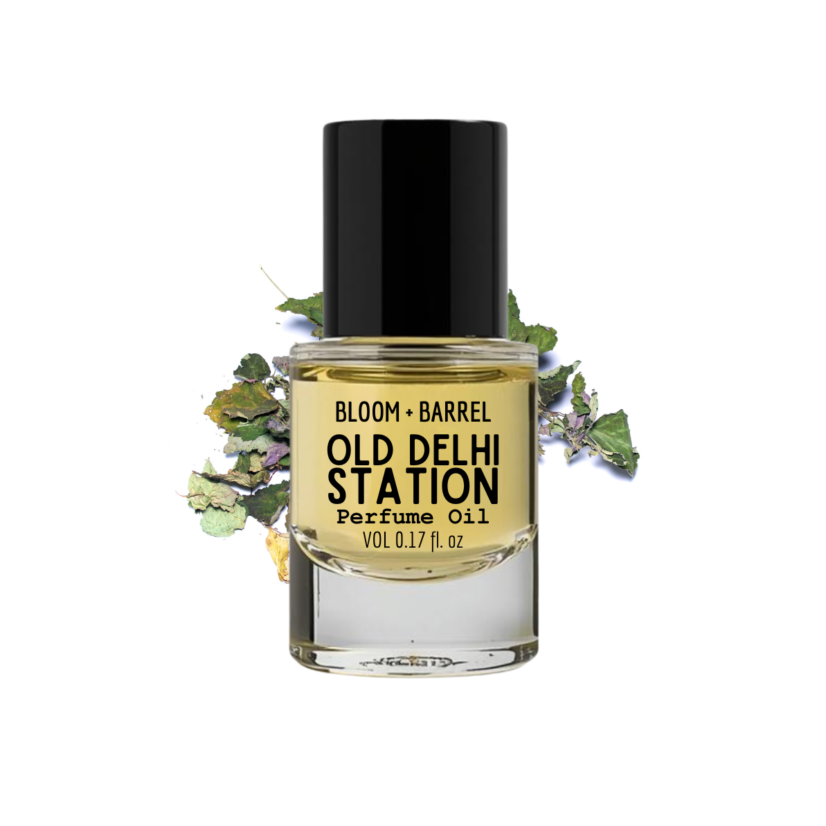 Perfume oil bottle labeled 'Old Delhi Station' by Bloom & Barrel with green leaves on a white background