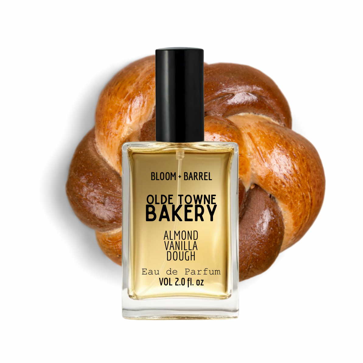 Perfume bottle labeled 'Olde Towne Bakery' with a loaf of bread in the background