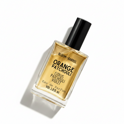 Perfume bottle labeled 'Orange Patchouli' by Bloom & Barrel on a white background