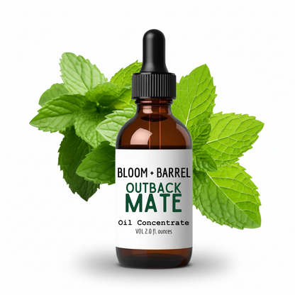 Bottle of Bloom + Barrel Outback Mate Oil Concentrate with mint leaves on a white background