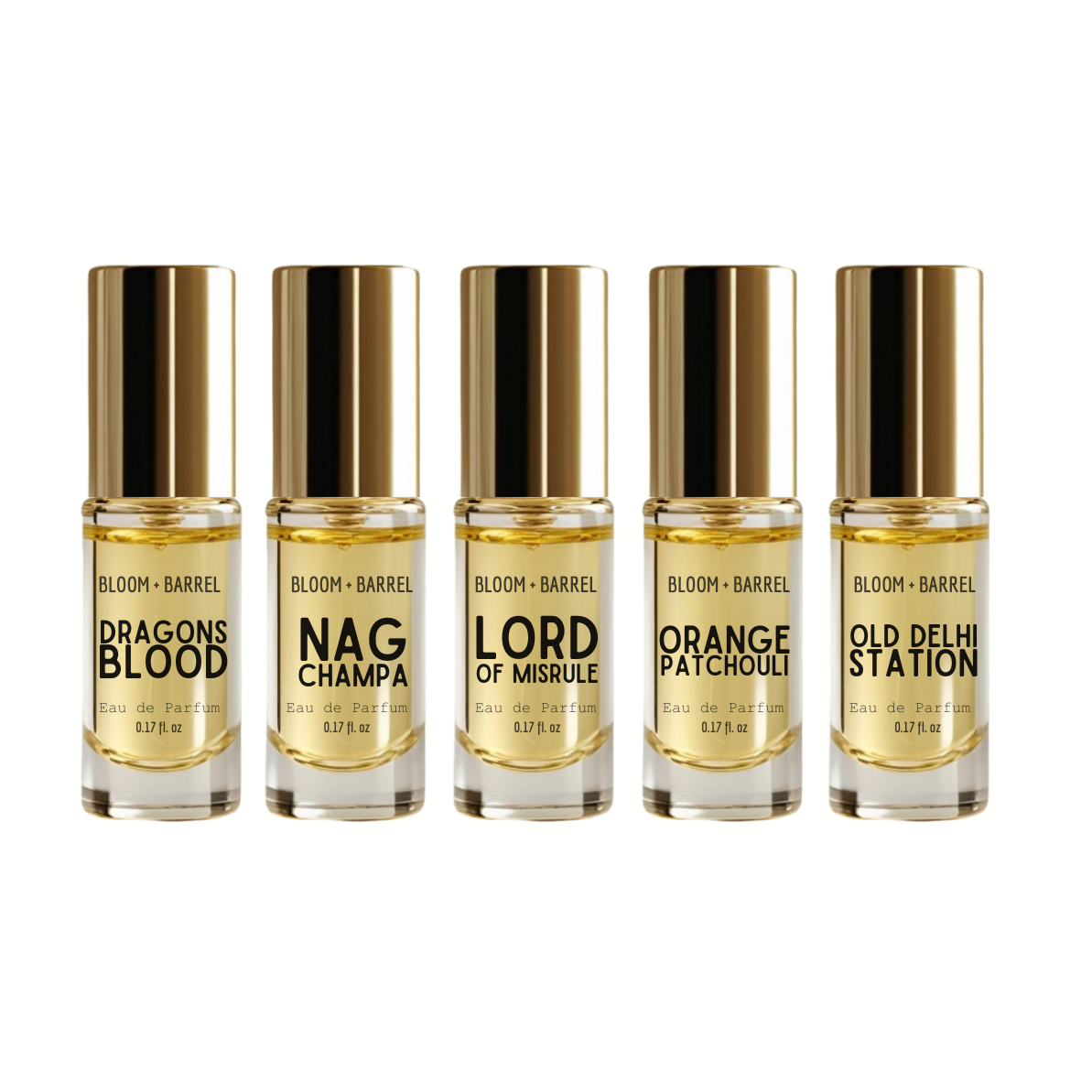 Five small perfume bottles with gold caps on a white background