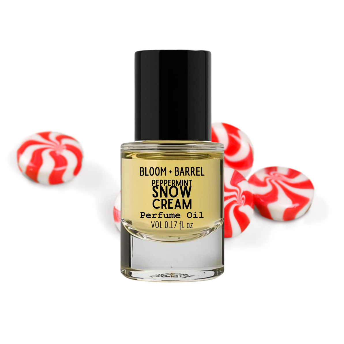 Perfume oil bottle labeled 'Peppermint Snow Cream' with peppermint candies on a white background