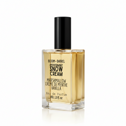 Perfume bottle labeled 'Bloom + Barrel Peppermint Snow Cream' on a white background