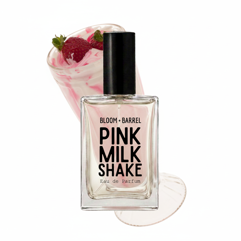 A bottle of Bloom + Barrel Pink Milk Shake Eau de Parfum centered on a white background, with a pink whipped drink and strawberries composited behind it as a styled fragrance concept.