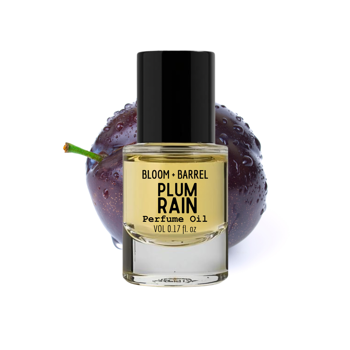 Bottle of Bloom & Barrel Plum Rain perfume oil with a plum in the background