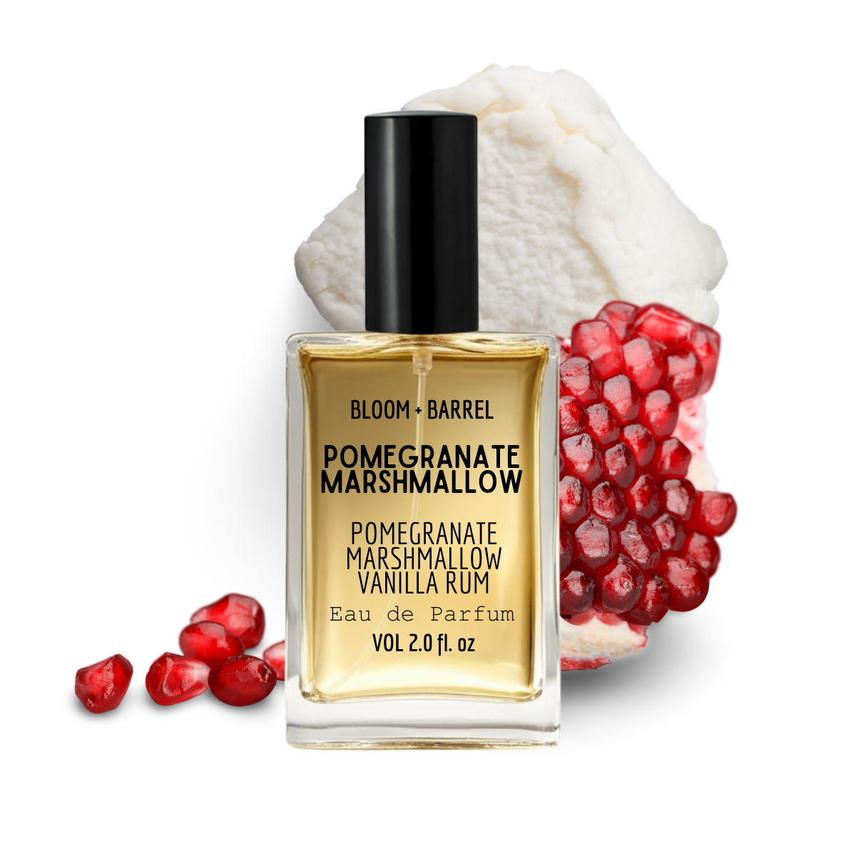 Bottle of Bloom & Barrel Pomegranate Marshmallow Vanilla Rum Eau de Parfum with pomegranate fruits on a white background
