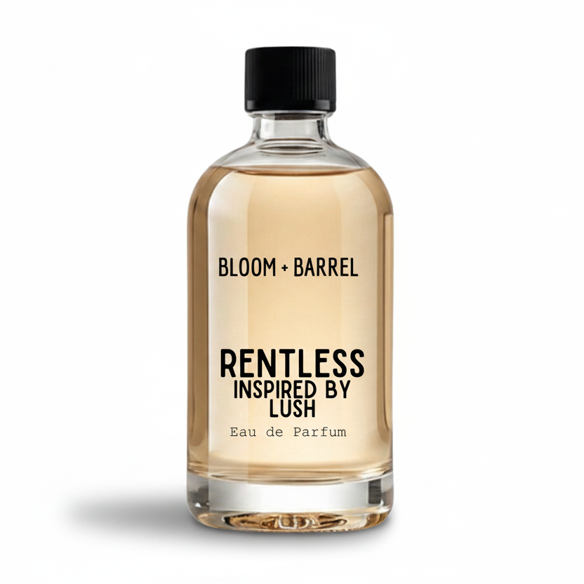 A clear glass bottle of Bloom Barrel Rentless Inspired By Lush Eau de Parfum with a black cap, containing a light amber liquid, on a solid white background.
