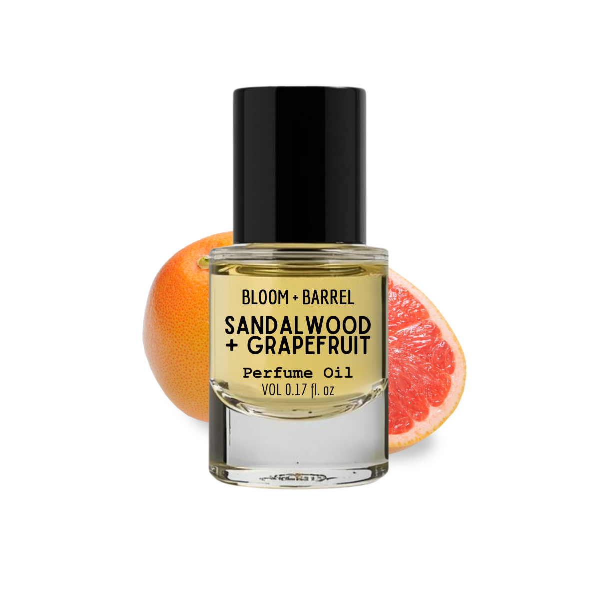 Perfume oil bottle labeled 'Sandalwood + Grapefruit' with a grapefruit fruit on a white background