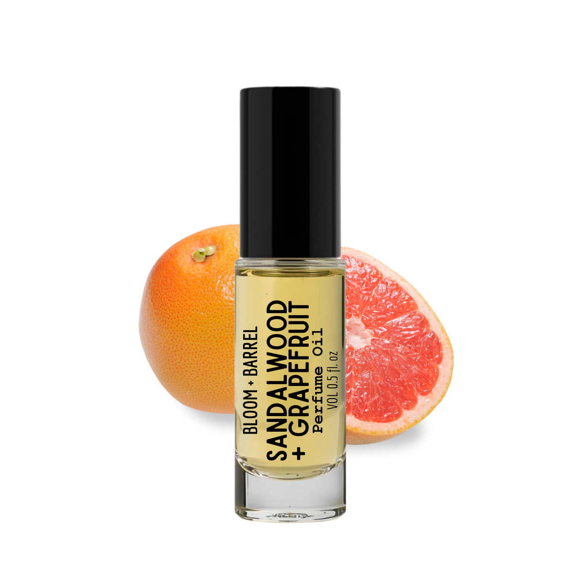 Perfume bottle labeled 'Sandalwood + Grapefruit' with a grapefruit fruit on a white background