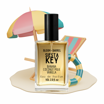 Perfume bottle labeled 'Siesta Key' with a colorful beach umbrella and lounge chair in the background.