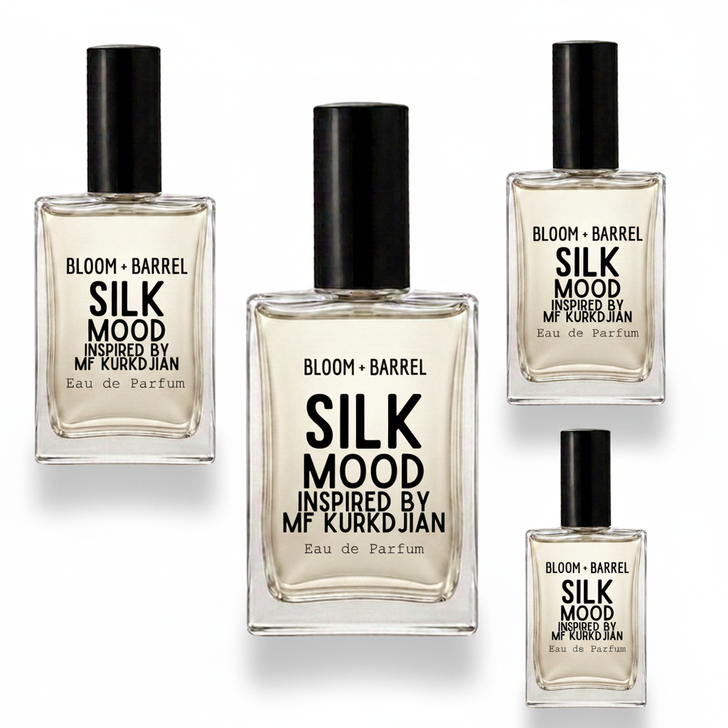 Four glass bottles of Bloom + Barrel Silk Mood Eau de Parfum in different sizes, arranged on a plain white background. The bottles contain a pale golden liquid and are topped with black caps, featuring black text on the front labels.