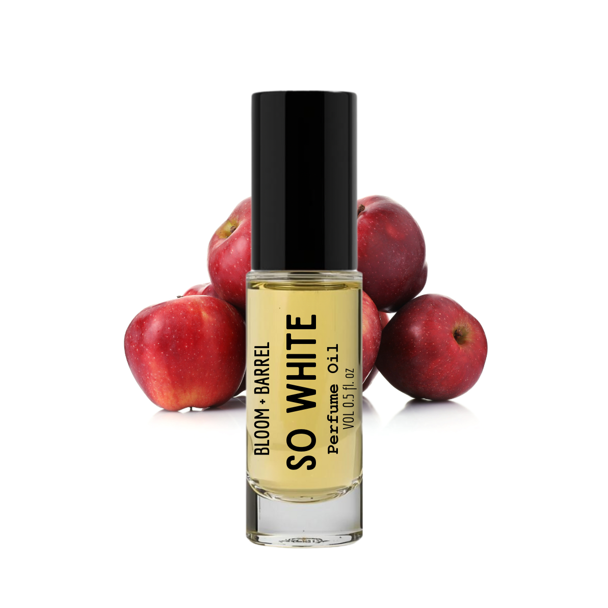 Perfume bottle labeled 'So White' by Bloom Barrel with red apples on a white background