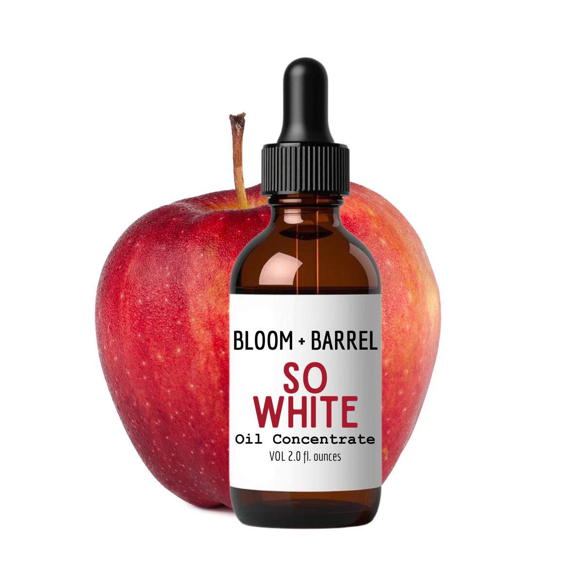 Bottle of 'Bloom + Barrel So White' oil concentrate with an apple on a white background