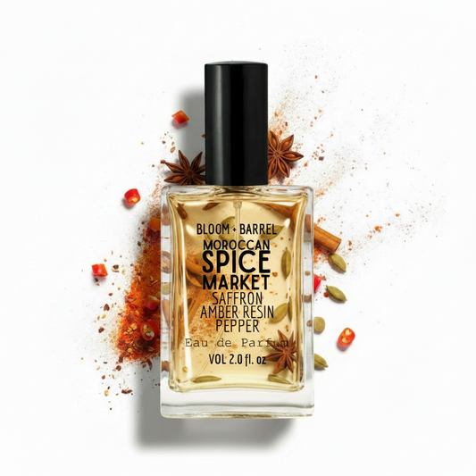 Perfume bottle labeled 'Moroccan Spice Market' with spice ingredients on a white background