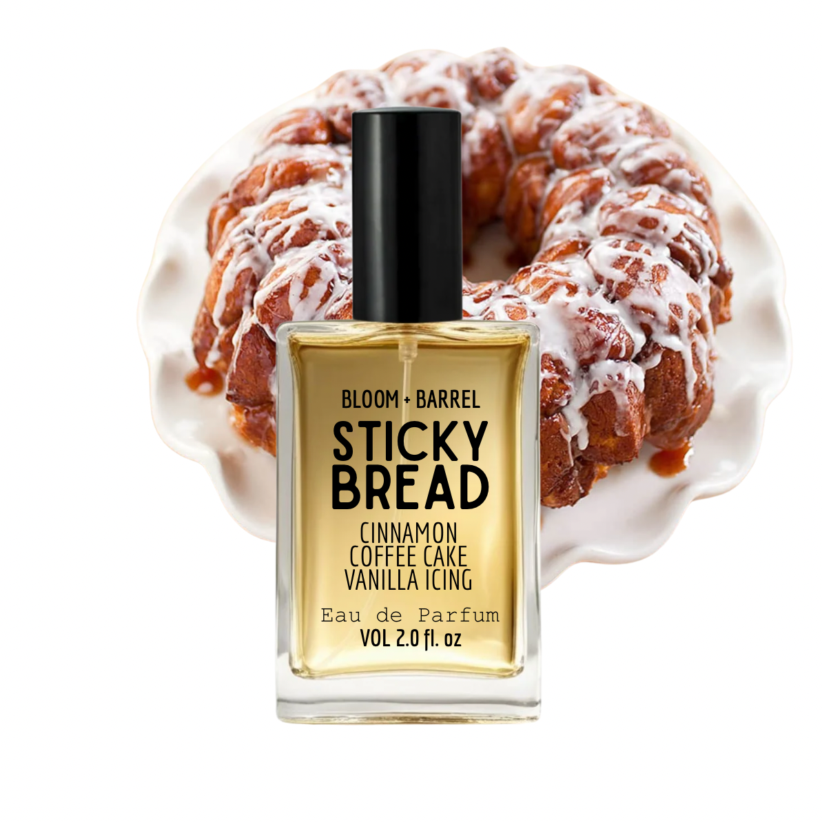Bloom + Barrel Sticky Bread Eau de Parfum bottle in front of a glazed cinnamon coffee cake on a white plate, against a white background.