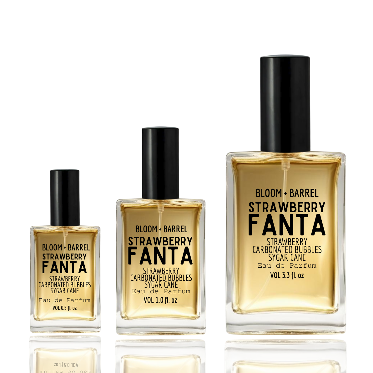 Three glass perfume bottles of BLOOM + BARREL STRAWBERRY FANTA with black caps, arranged by size on a white background with reflections.