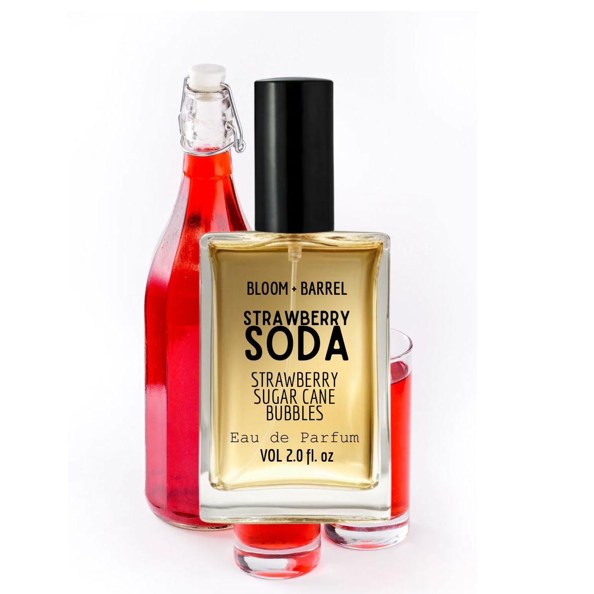 Bottle of 'Strawberry Soda' perfume with gold label on a white background