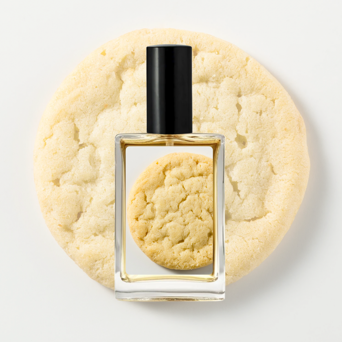 Perfume bottle with a cookie on a white background