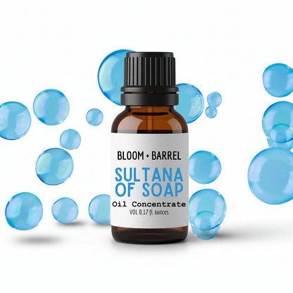 Bottle of Bloom & Barrel Sultana of Soap Oil Concentrate with blue bubbles on a white background