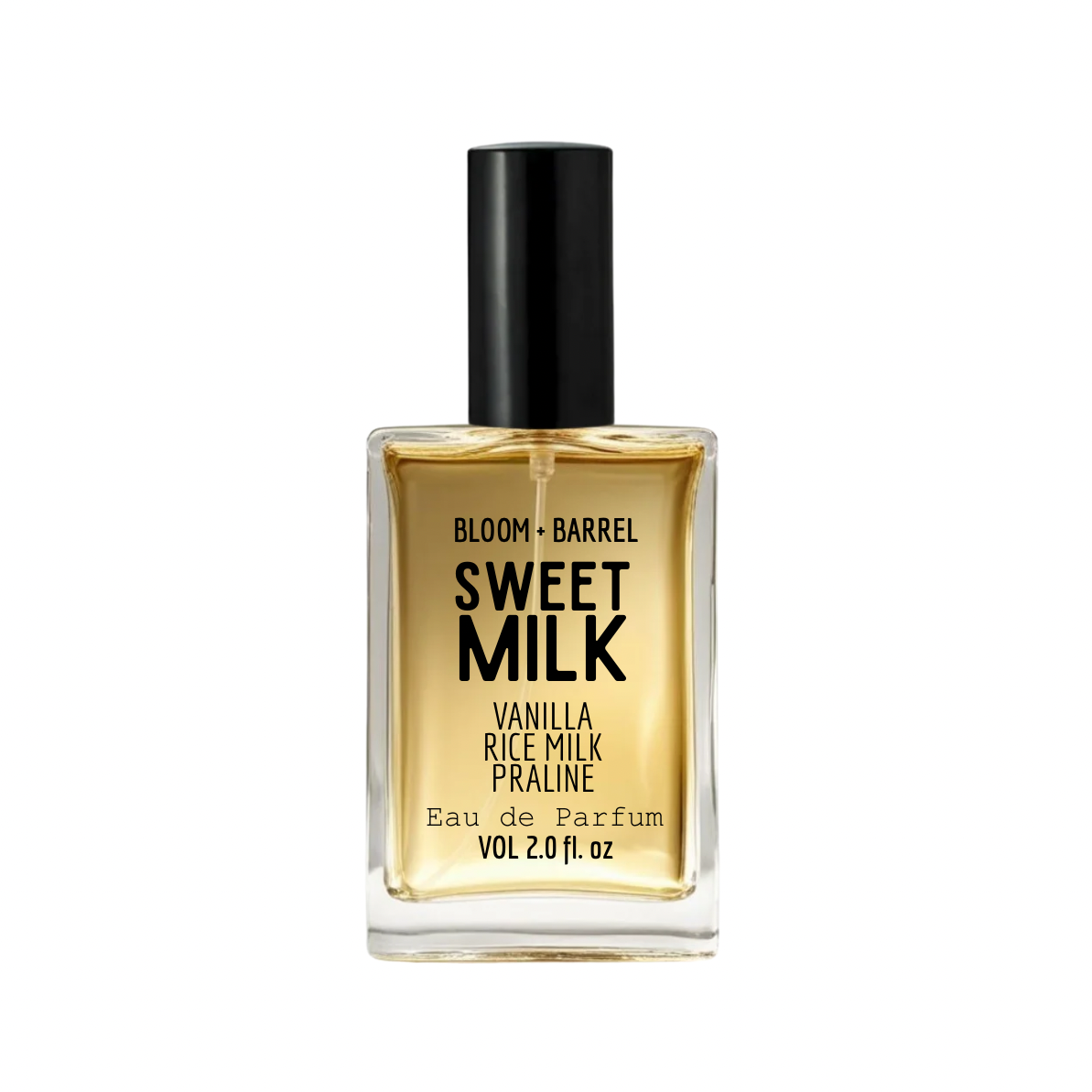A rectangular glass bottle of Bloom + Barrel Sweet Milk Eau de Parfum with a black cap, filled with golden-amber liquid, on a plain white background.