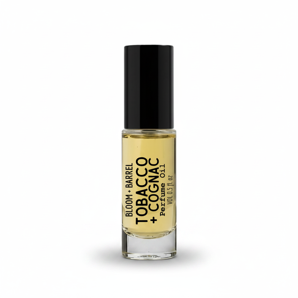 Perfume bottle labeled 'Bloom + Barrel Tobacco & Cognac' on a white background