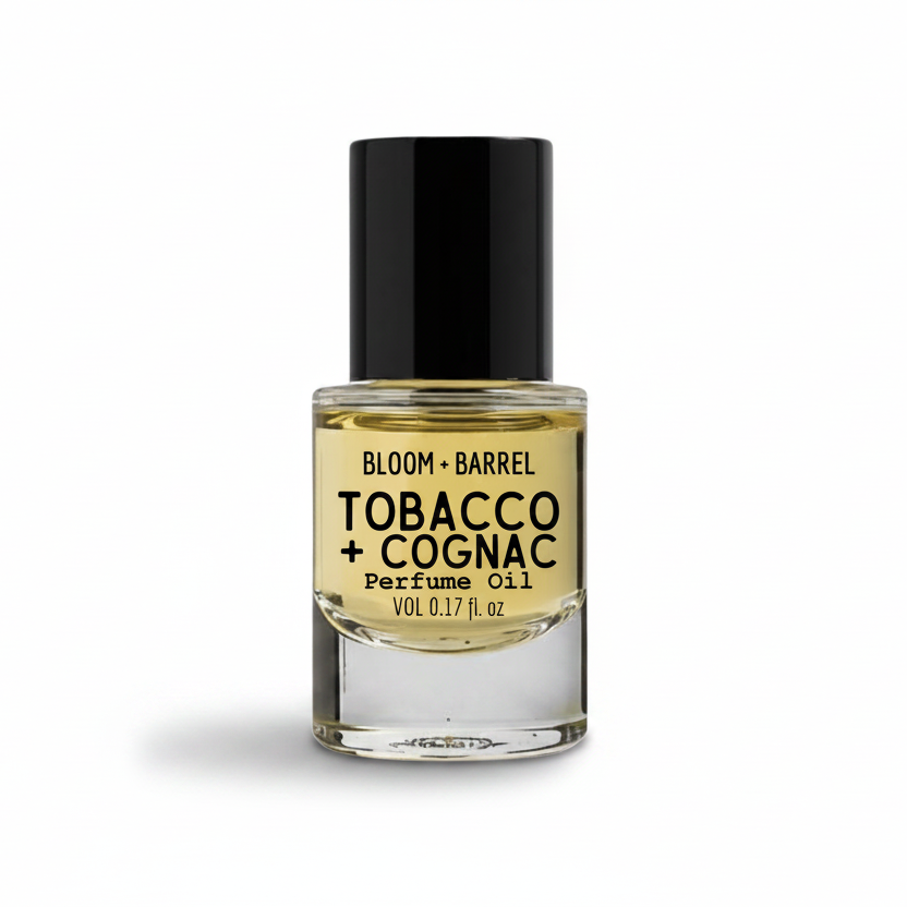 Perfume oil bottle labeled 'Tobacco + Cognac' by Bloom & Barrel on a white background