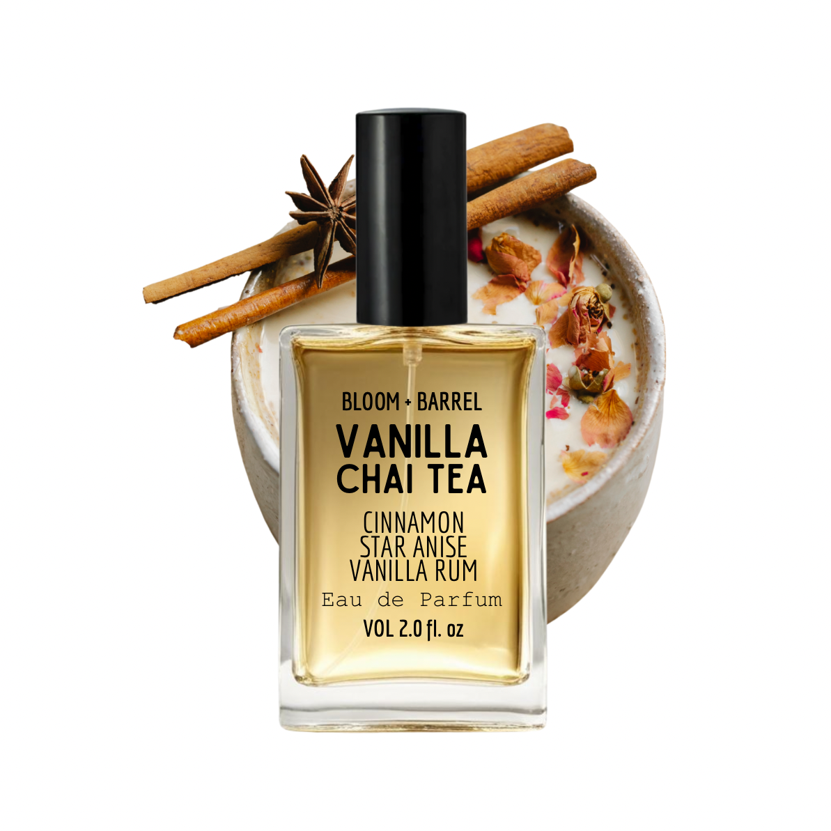 Vanilla Chai Tea perfume bottle with a cup of tea and cinnamon sticks on a white background